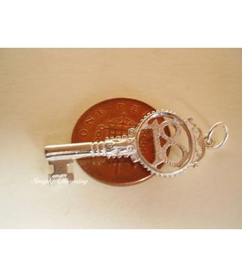 Eighteen 18 Key Sterling Silver Charm / Pendant