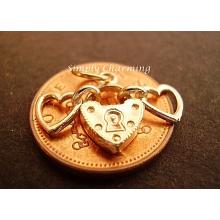 Two Hearts Locked Together 9ct Gold Charm