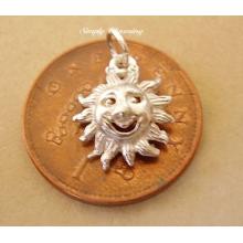Miniature Sun Silver Charm